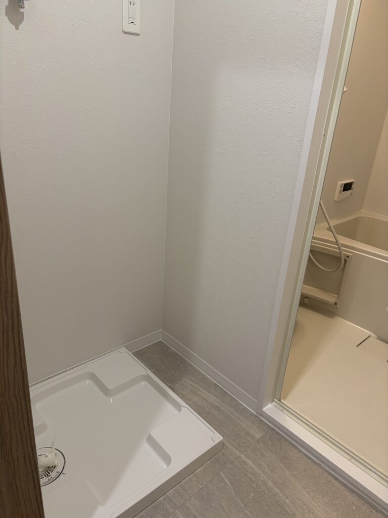 トーアマンションのバスルームと洗濯機置き場